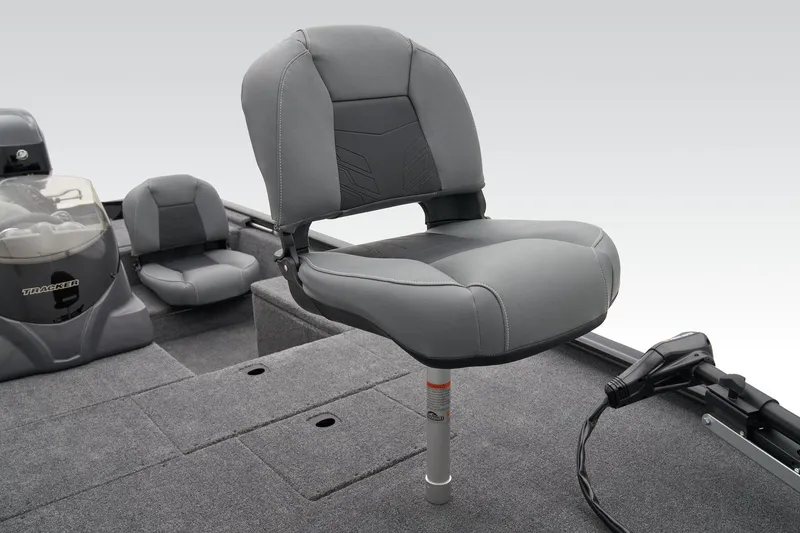 Slide: The Image of Control panel of 2025 Tracker Pro 170 boat with switches and textured finish. - 16