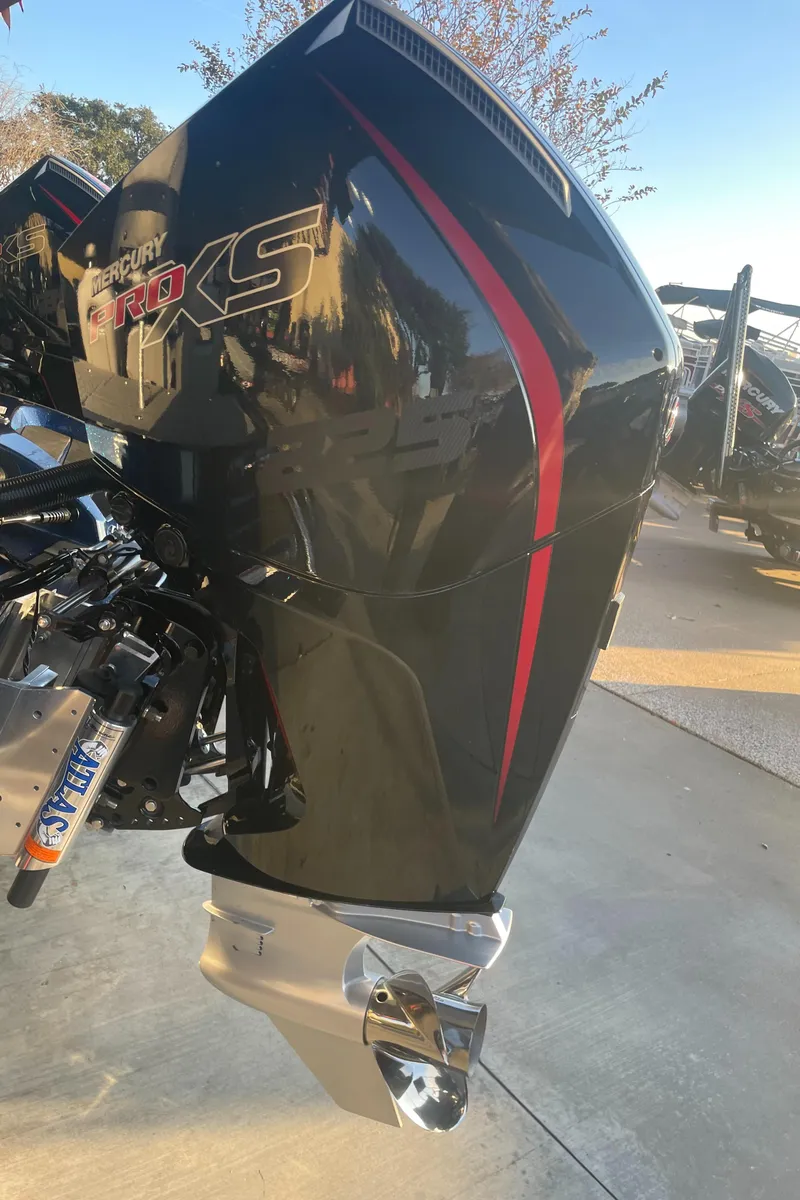 Slide: The Image of 2023 Nitro Z20 boat engine with sleek black and red design. - 3