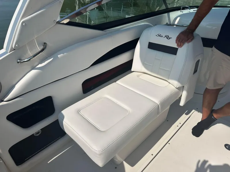 Slide: The Image of 2015 Sea Ray 300 SLX boat interior with white leather seating. - 13