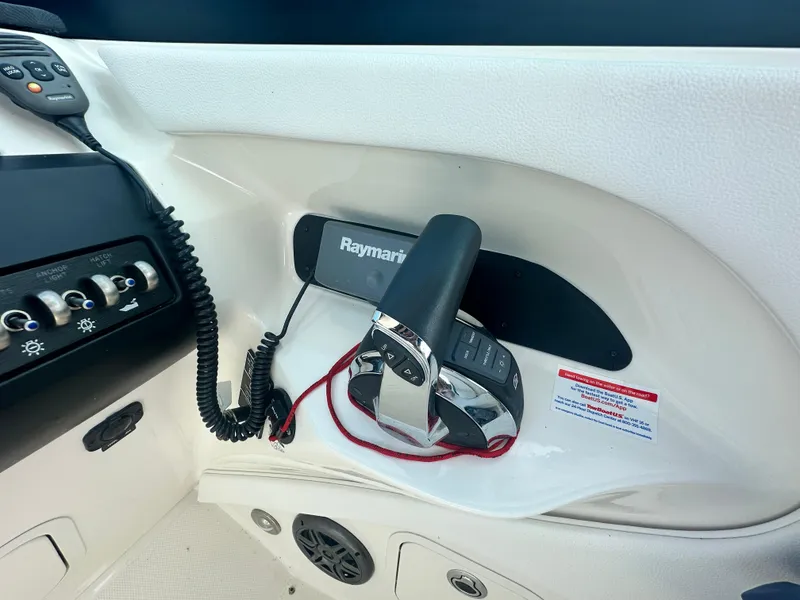 Slide: The Image of Control panel of a 2015 Sea Ray 300 SLX boat with Raymarine equipment. - 18