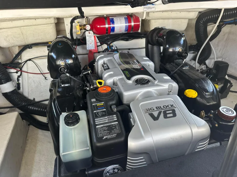 Slide: The Image of Engine compartment of a 2015 Sea Ray 300 SLX with a Big Block V8 engine. - 31