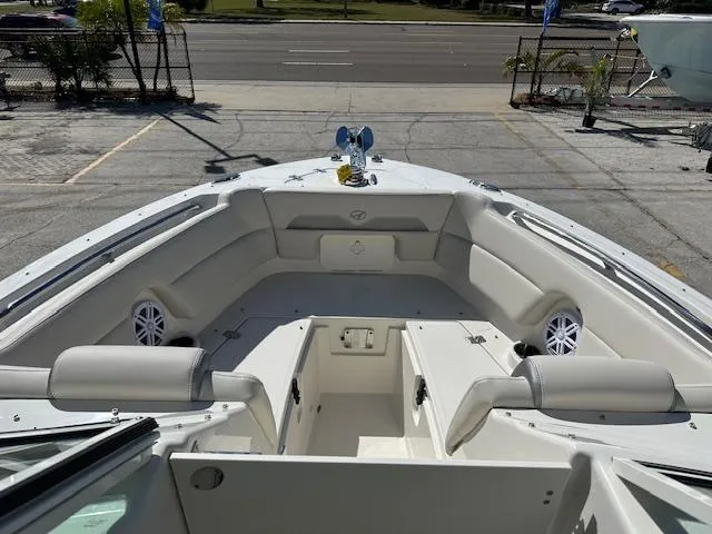 Slide: The Image of 2025 Sailfish 245 DC boat interior with spacious seating and modern design. - 18