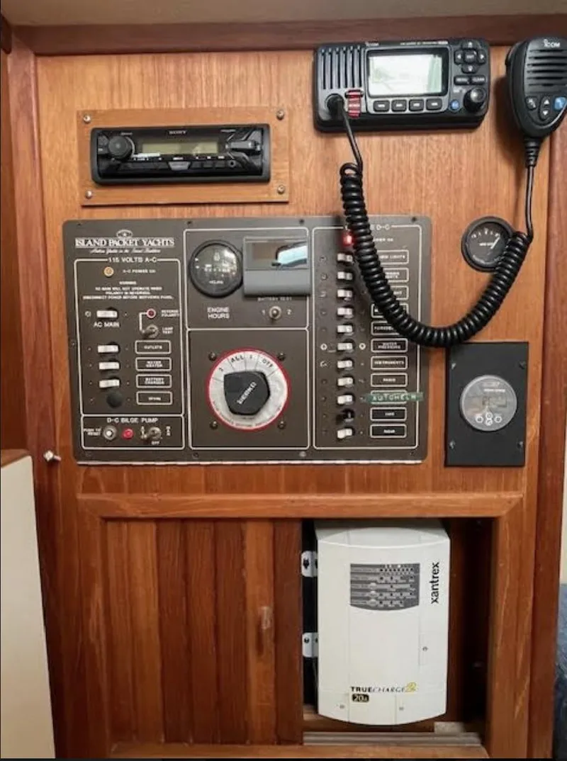 Slide: The Image of Control panel of a 1987 Island Packet 31 yacht with radio and navigation equipment. - 5