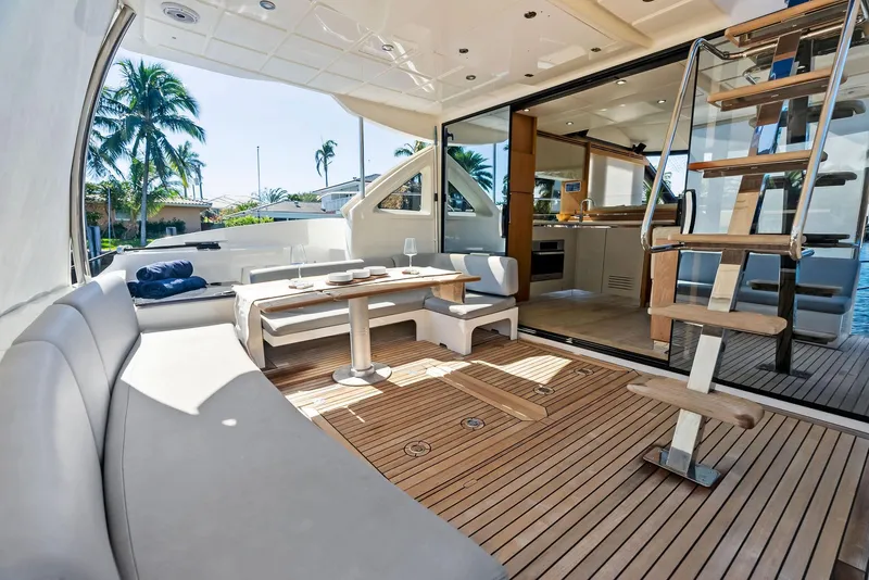 Slide: The Image of Luxurious 2013 Absolute 55 FLY yacht interior with elegant seating and wooden flooring. - 18
