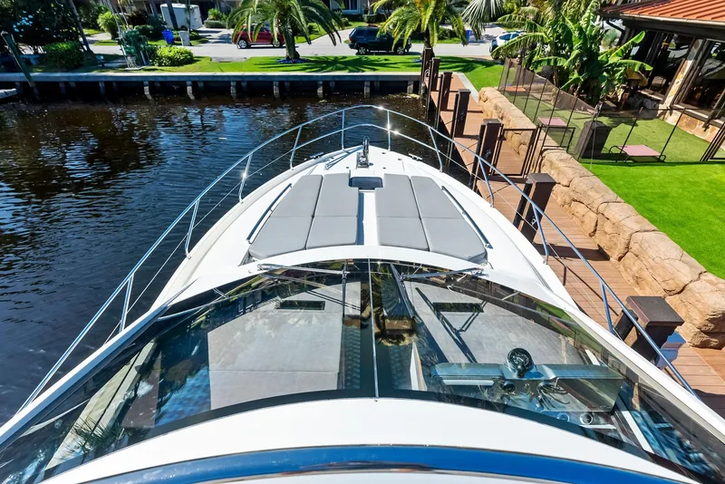 Slide: The Image of Aerial view of 2013 Absolute 55 FLY yacht docked by a lush waterfront. - 20