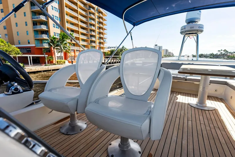 Slide: The Image of Luxury seating on 2013 Absolute 55 FLY yacht deck with waterfront view. - 29