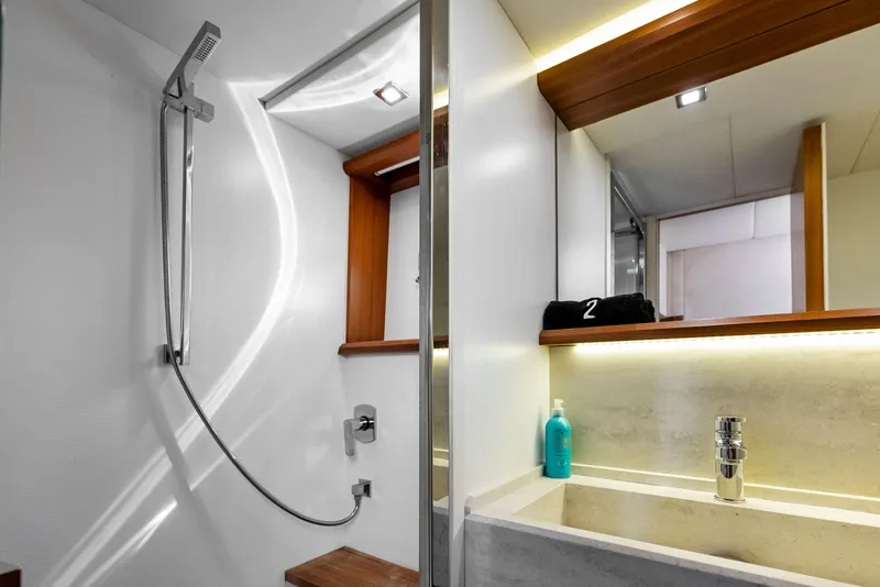Slide: The Image of Luxurious bathroom on 2013 Absolute 55 FLY yacht with modern shower and sink. - 44
