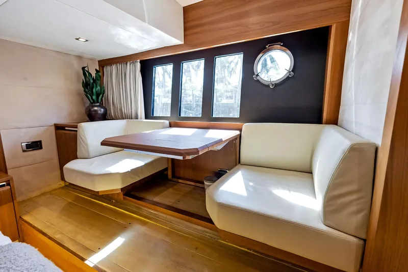 Slide: The Image of Luxurious interior of 2013 Absolute 55 FLY yacht with elegant seating and table. - 47