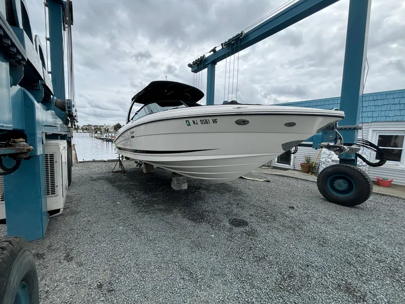 Slide: The Image of 2013 Sea Ray 270 SLX boat on dry dock, ready for maintenance. - 38