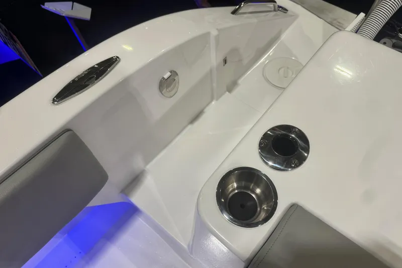 Slide: The Image of 2023 Cape Horn 34 XS boat interior with cup holders and seating. - 14