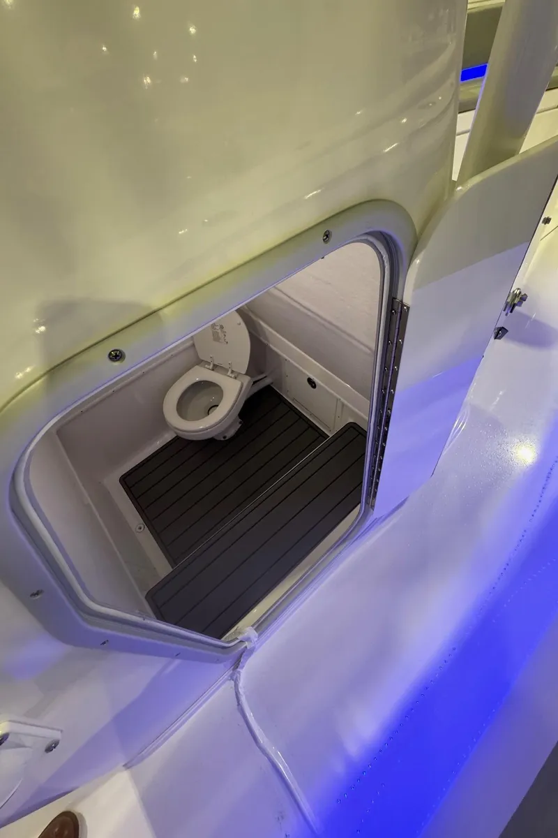 Slide: The Image of 2023 Cape Horn 34 XS boat interior with compact marine toilet. - 8