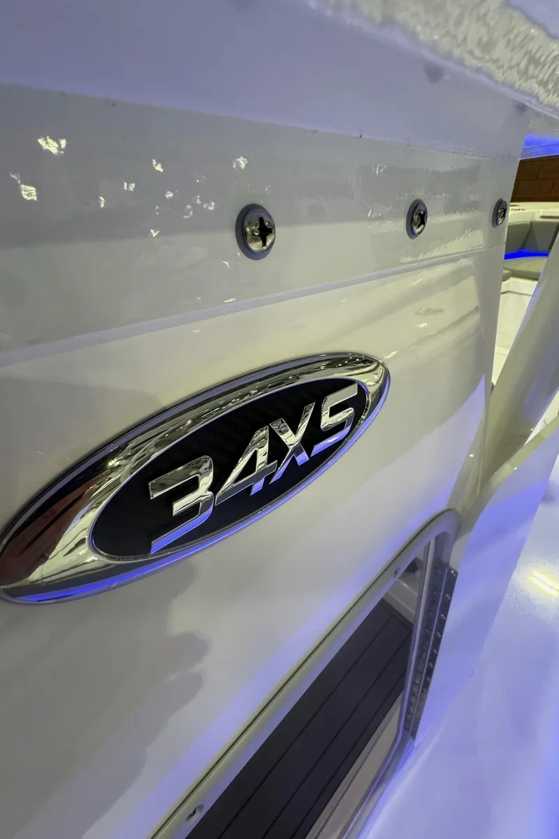Slide: The Image of 2023 Cape Horn 34 XS boat, close-up of model emblem. - 7