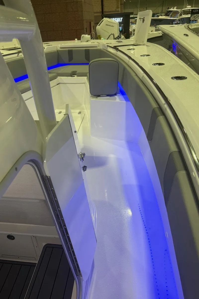 Slide: The Image of 2023 Cape Horn 34 XS boat interior with blue LED lighting. - 9