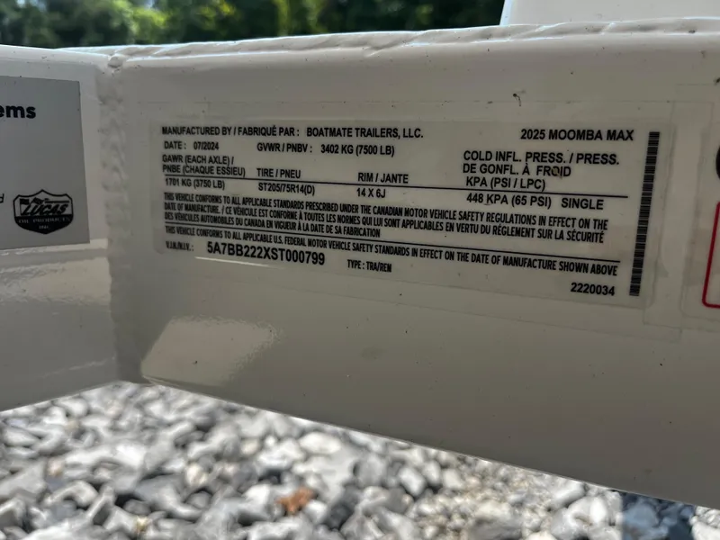 Slide: The Image of Label on 2025 Moomba Max trailer by Boatmate Trailers, LLC, showing specifications and tire pressure. - 7