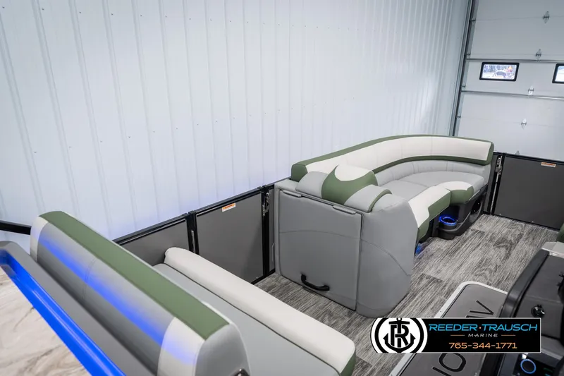 Slide: The Image of 2025 Avalon Catalina Entertainer boat interior with stylish seating and modern design. - 24