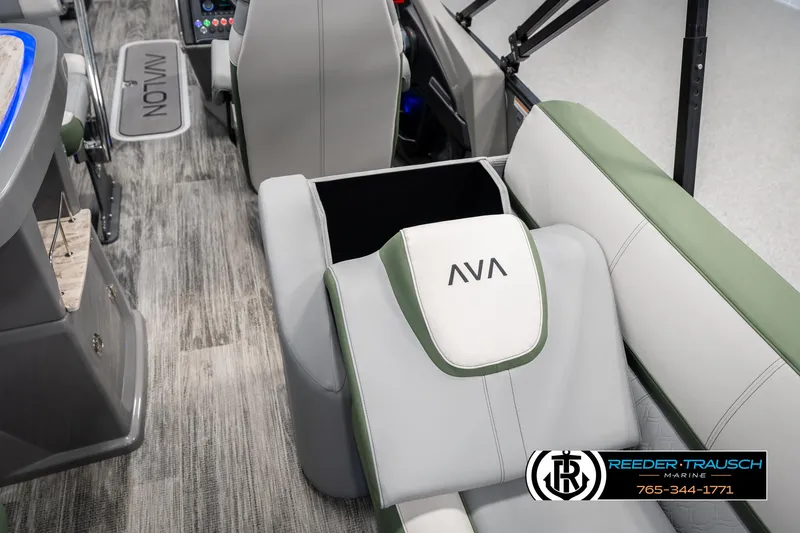Slide: The Image of 2025 Avalon Catalina Entertainer boat interior with seating and control panel. - 27
