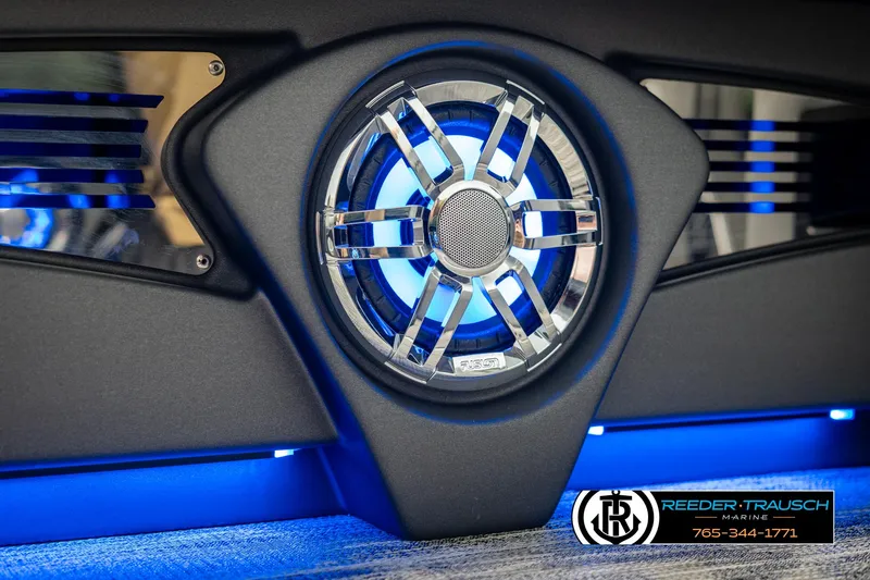 Slide: The Image of 2025 Avalon Catalina Entertainer speaker with blue LED lighting, Reeder-Trausch Marine branding. - 38