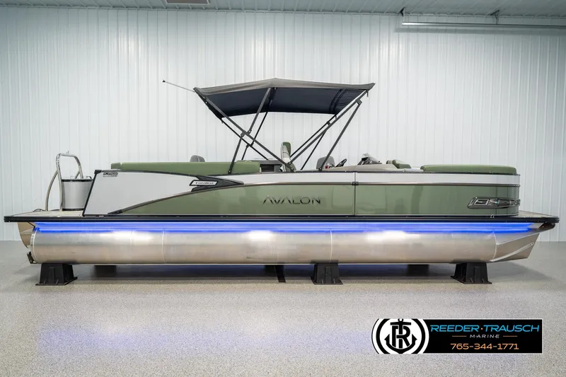 Slide: The Image of 2025 Avalon Catalina Entertainer pontoon boat with canopy and blue underglow lighting. - 4