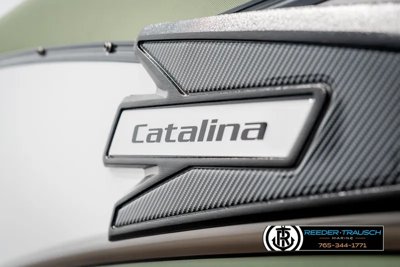 Slide: The Image of 2025 Avalon Catalina Entertainer boat logo with carbon fiber detail, Reeder-Trausch Marine branding. - 47