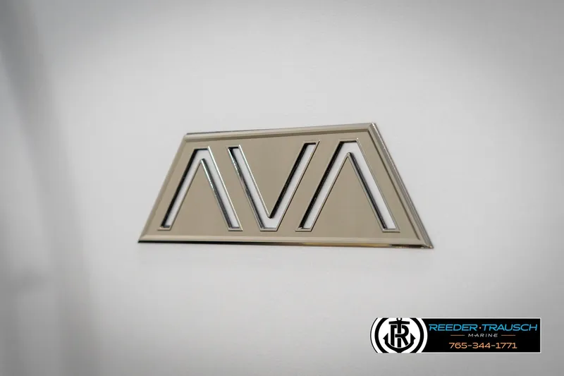 Slide: The Image of 2025 Avalon Catalina Entertainer logo on sleek surface, featuring Reeder-Trausch Marine branding. - 49