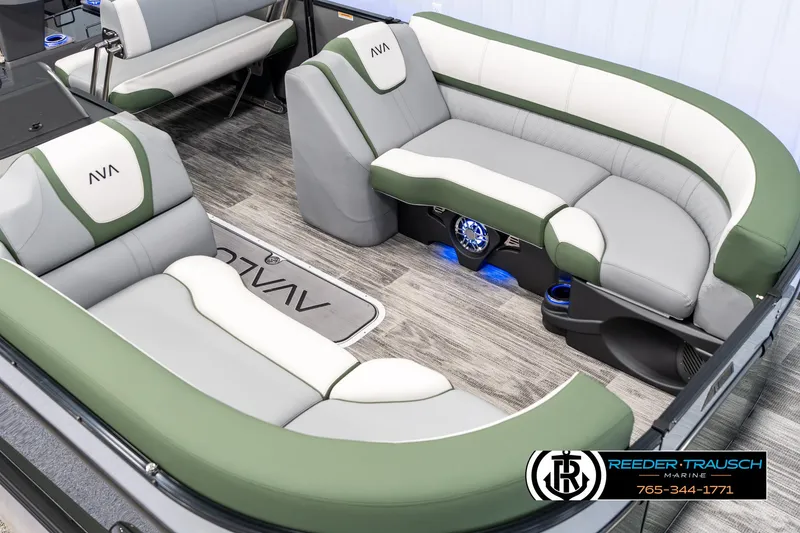 Slide: The Image of Luxurious seating on 2025 Avalon Catalina Entertainer boat with green and white upholstery. - 8