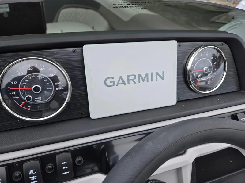 Slide: The Image of Dashboard of 2025 Godfrey SWEETWATER 2286 SFL with Garmin display and gauges. - 15
