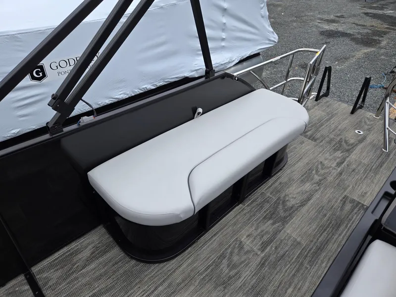 Slide: The Image of 2025 Godfrey SWEETWATER 2286 SFL boat with sleek seating and modern design. - 20