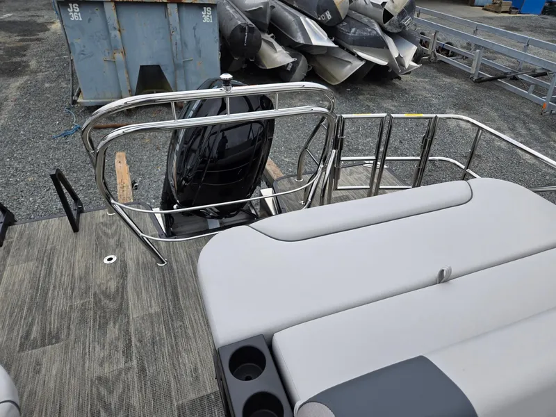 Slide: The Image of 2025 Godfrey SWEETWATER 2286 SFL pontoon boat with outboard motor and seating. - 22