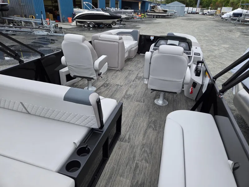 Slide: The Image of 2025 Godfrey SWEETWATER 2286 SFL pontoon boat interior with seating and helm. - 27