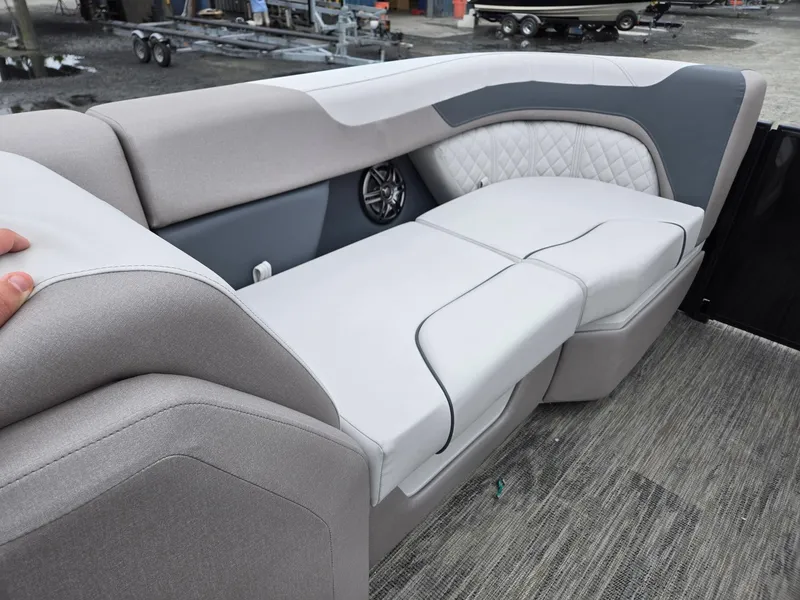Slide: The Image of 2025 Godfrey SWEETWATER 2286 SFL boat interior with plush seating and modern design. - 35