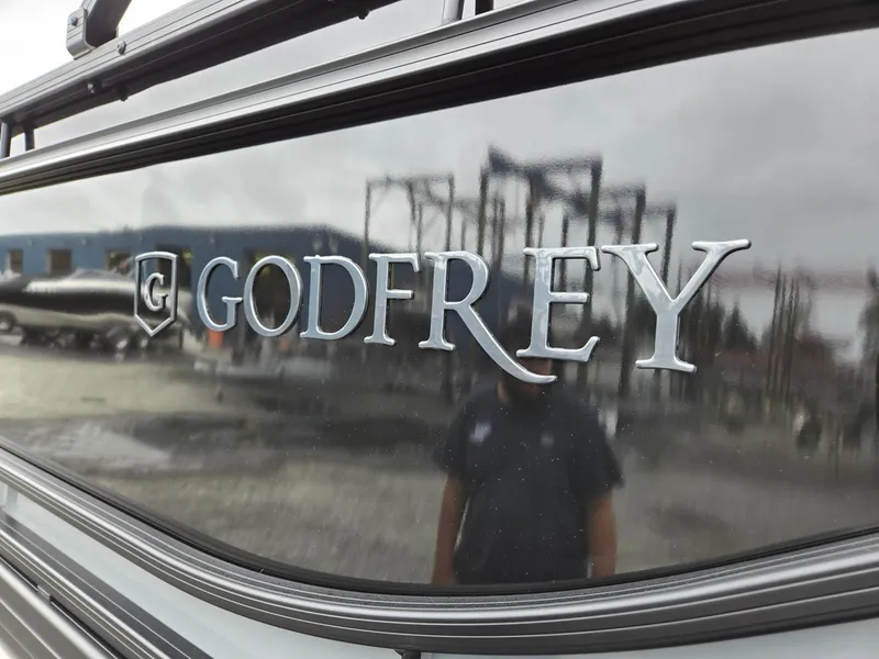 Slide: The Image of Close-up of 2025 Godfrey SWEETWATER 2286 SFL logo on boat exterior. - 36