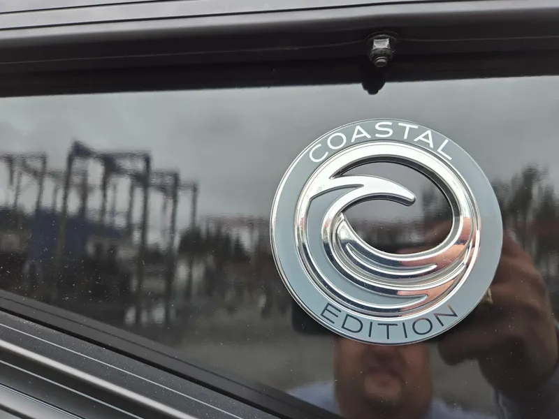 Slide: The Image of 2025 Godfrey SWEETWATER 2286 SFL Coastal Edition emblem on a reflective surface. - 38