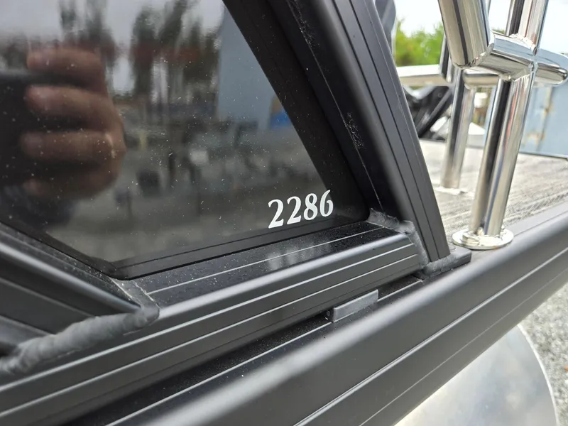 Slide: The Image of Close-up of Godfrey SWEETWATER 2286 SFL boat, model year 2025, showing model number. - 39