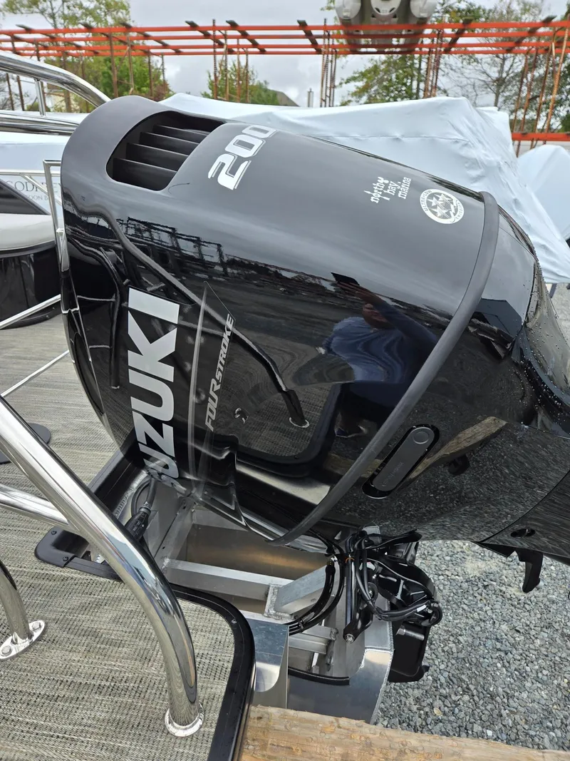 Slide: The Image of Suzuki 200 horsepower outboard motor on 2025 Godfrey SWEETWATER 2286 SFL boat. - 40