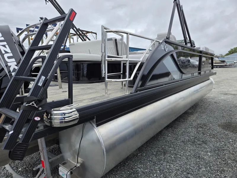 Slide: The Image of 2025 Godfrey SWEETWATER 2286 SFL pontoon boat on gravel lot. - 5