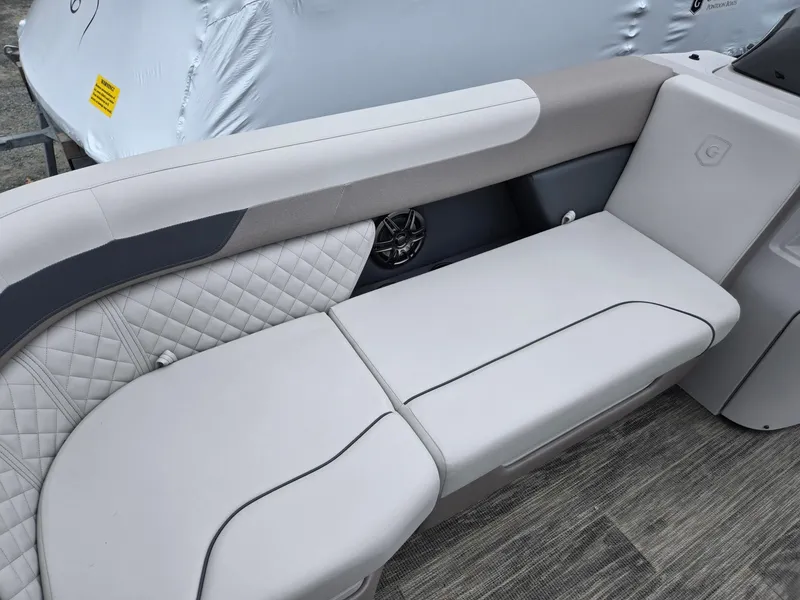 Slide: The Image of 2025 Godfrey SWEETWATER 2286 SFL boat interior seating with quilted upholstery. - 9
