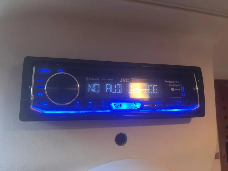 Slide: The Image of JVC stereo system in 2004 Mainship 30 Pilot II Express Cruiser, displaying "No Audio Device." - 27