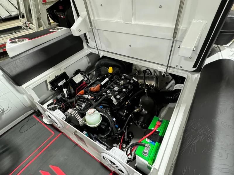 Slide: The Image of 2025 Highfield Velox 420 engine compartment, showcasing detailed mechanical components and battery setup. - 25