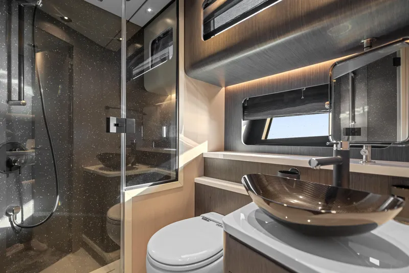 Slide: The Image of Luxurious bathroom interior of 2025 Canados 571 yacht with modern fixtures and elegant design. - 16