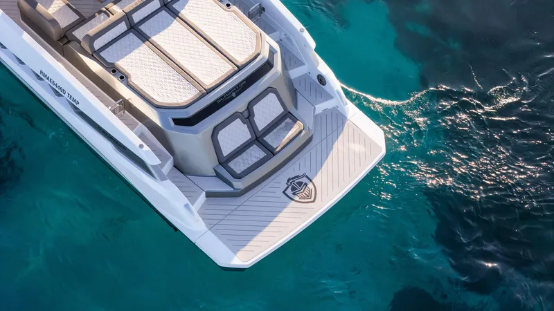 Slide: The Image of 2025 Canados 571 yacht on clear blue water, aerial view. - 5