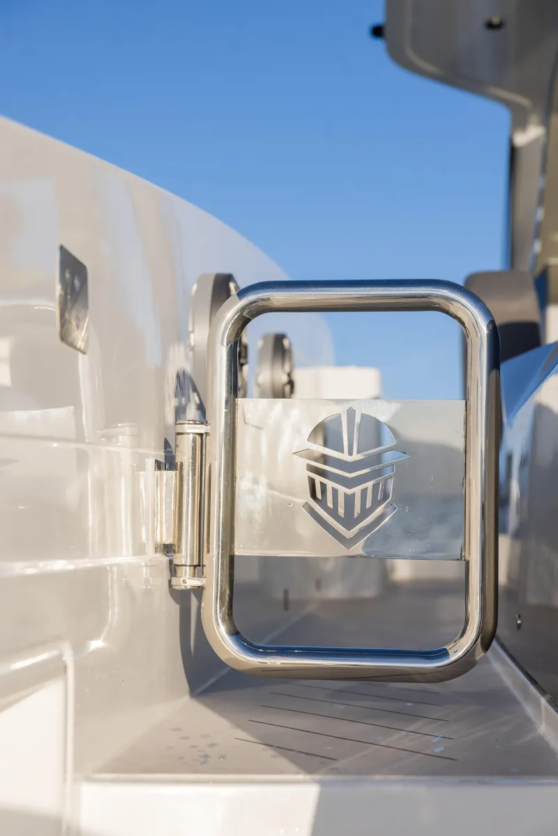 Slide: The Image of Stainless steel railing on 2025 Canados 571 yacht against clear blue sky. - 7