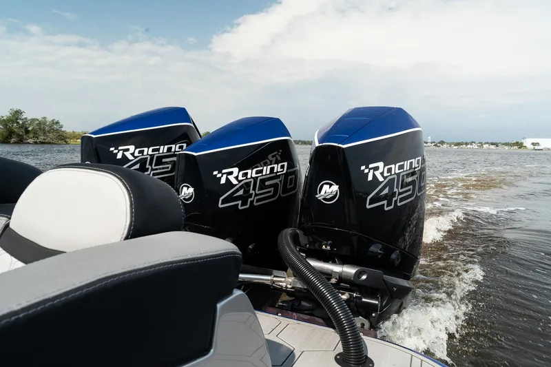 Slide: The Image of 2023 Statement 380 Open boat cruising on a calm lake. - 13