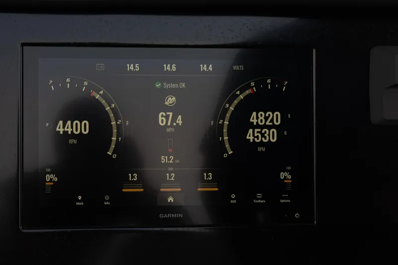 Slide: The Image of Garmin display on 2023 Statement 380 Open showing RPM and system diagnostics. - 26