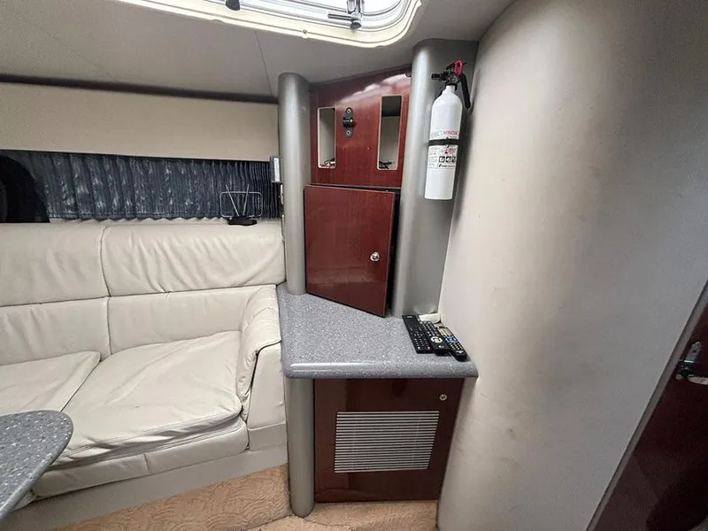 Slide: The Image of Interior of 2006 Formula 400 Super Sport yacht with seating and cabinetry. - 17