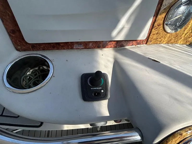 Slide: The Image of Control panel of a 2006 Formula 400 Super Sport boat with Lewmar joystick. - 6
