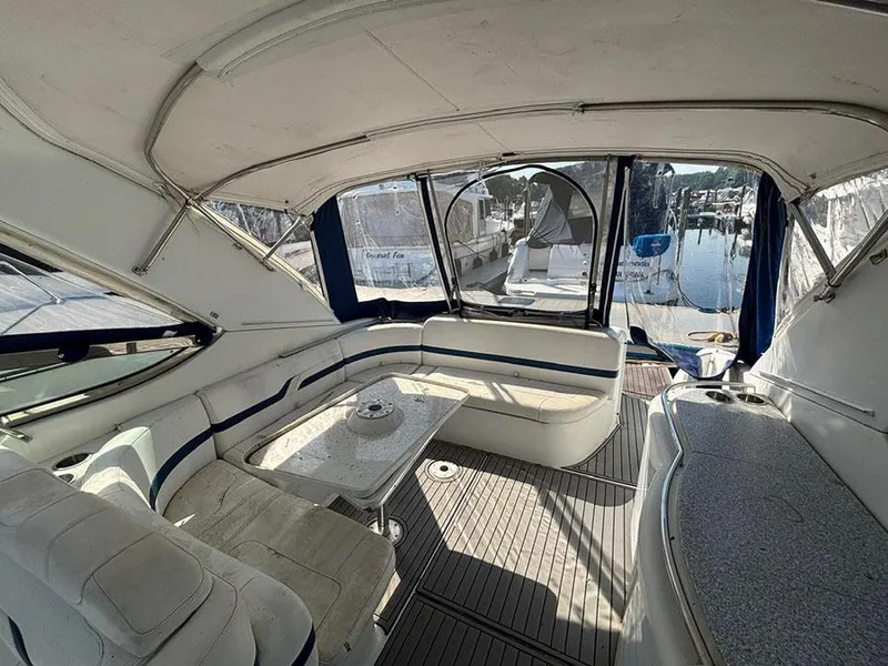Slide: The Image of Interior of a 2006 Formula 400 Super Sport yacht with seating and table. - 9