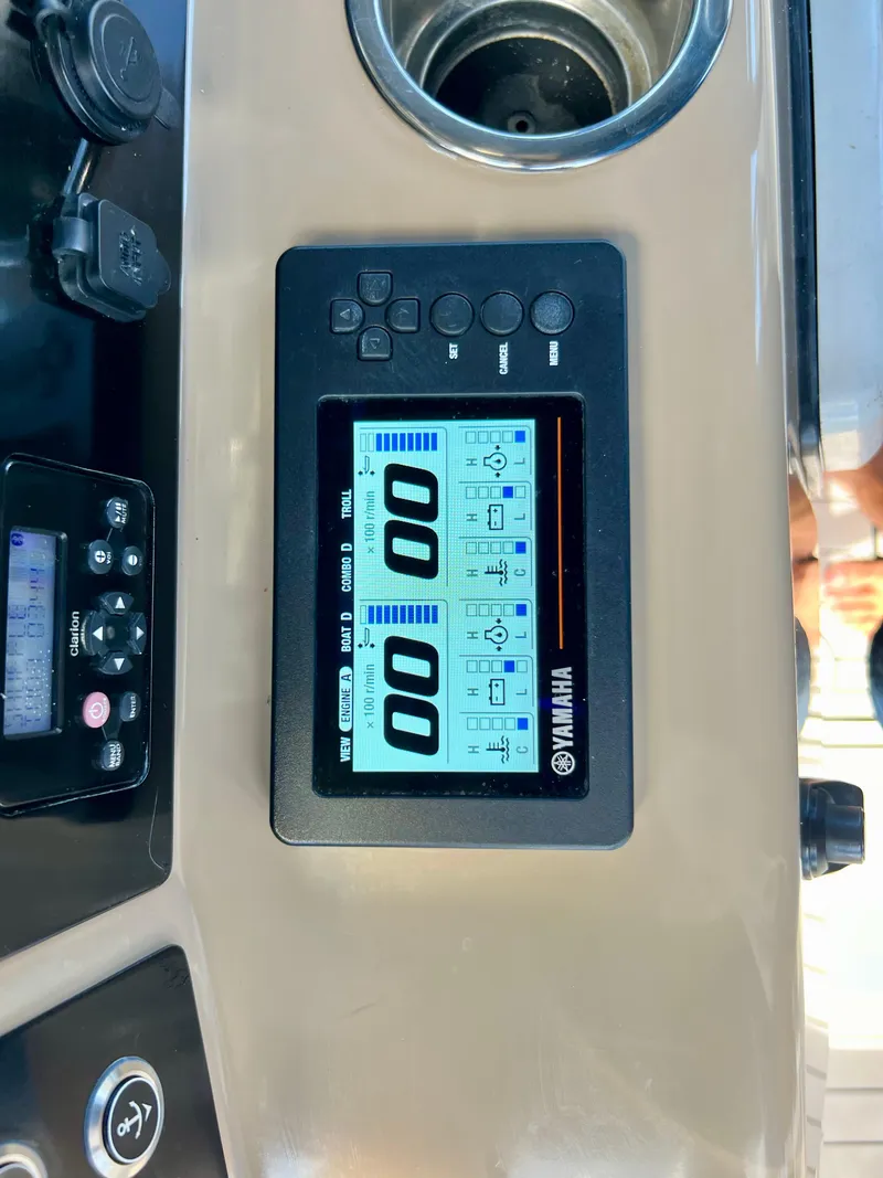 Slide: The Image of Yamaha digital display on 2021 Robalo R272 Center Console boat dashboard. - 15
