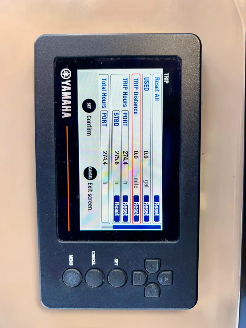 Slide: The Image of Yamaha display on 2021 Robalo R272 Center Console boat showing trip data. - 16