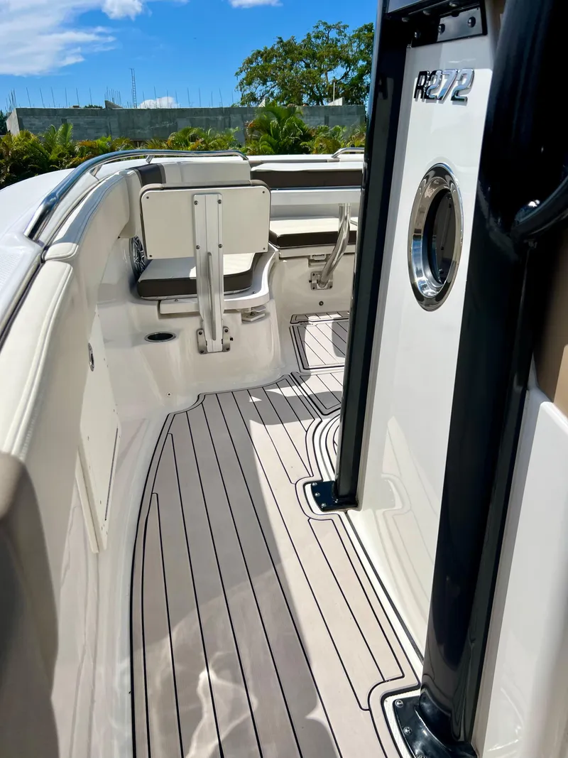 Slide: The Image of 2021 Robalo R272 Center Console boat interior with sleek deck design. - 24