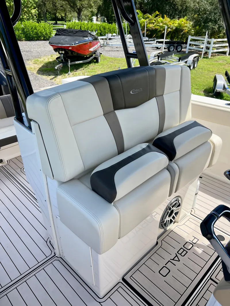 Slide: The Image of 2021 Robalo R272 Center Console boat seating with stylish upholstery. - 27